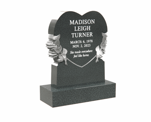 Heart-Shaped Memorial Headstone with Floral Engraving in a Peaceful Cemetery - Image 1