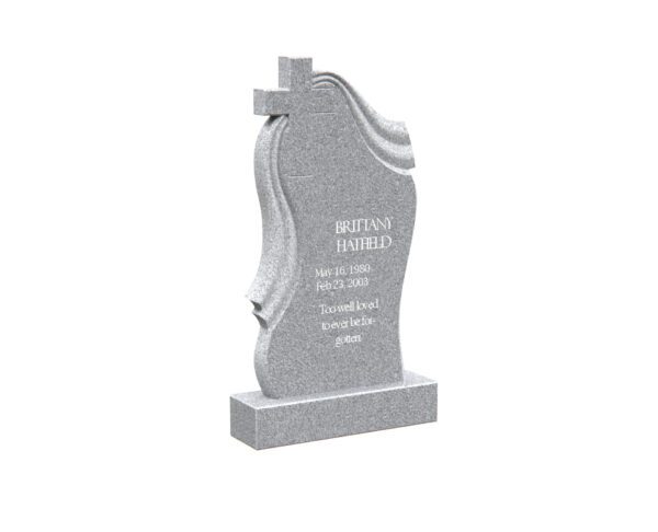 Artistic Monument with Draped Design and Cross Accent - Image 1